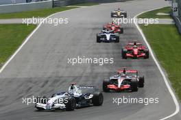 10.06.2007 Montreal, Canada,  Nick Heidfeld (GER), BMW Sauber F1 Team, F1.07 and Fernando Alonso (ESP), McLaren Mercedes, MP4-22 - Formula 1 World Championship, Rd 6, Canadian Grand Prix, Sunday Race