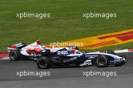 10.06.2007 Montreal, Canada,  Nico Rosberg (GER), WilliamsF1 Team, FW29 and Jarno Trulli (ITA), Toyota Racing, TF107 - Formula 1 World Championship, Rd 6, Canadian Grand Prix, Sunday Race