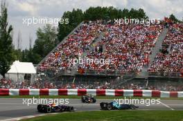 10.06.2007 Montreal, Canada,  Rubens Barrichello (BRA), Honda Racing F1 Team, RA107 and David Coulthard (GBR), Red Bull Racing, RB3, pass Mark Webber (AUS), Red Bull Racing, RB3 - Formula 1 World Championship, Rd 6, Canadian Grand Prix, Sunday Race
