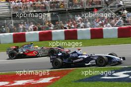 10.06.2007 Montreal, Canada,  Nico Rosberg (GER), WilliamsF1 Team, FW29 and Lewis Hamilton (GBR), McLaren Mercedes, MP4-22 - Formula 1 World Championship, Rd 6, Canadian Grand Prix, Sunday Race