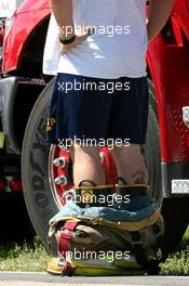 09.06.2007 Montreal, Canada,  A firefighter caught with his trousers down at the circuit - Formula 1 World Championship, Rd 6, Canadian Grand Prix, Saturday