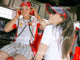 10.06.2007 Montreal, Canada,  Michael Schumacher (GER), Scuderia Ferrari, Advisor and Michelle Yeoh (MLY, ex. James Bond girl, actor) Girlfriend of Jean Todt - Formula 1 World Championship, Rd 6, Canadian Grand Prix, Sunday