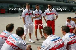 05.10.2007 Shanghai, China,  Ralf Schumacher (GER), Toyota Racing with Toyota team mates - Formula 1 World Championship, Rd 16, Chinese Grand Prix, Friday