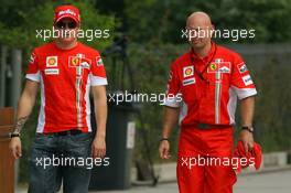 05.10.2007 Shanghai, China,  Kimi Raikkonen (FIN), Räikkönen, Scuderia Ferrari and Mark Arnell (GBR), Personal trainer to Kimi Raikkonen - Formula 1 World Championship, Rd 16, Chinese Grand Prix, Friday