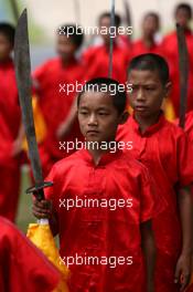 07.10.2007 Shanghai, China,  A Chinese Child with a sword - Formula 1 World Championship, Rd 16, Chinese Grand Prix, Sunday Pre-Race Grid