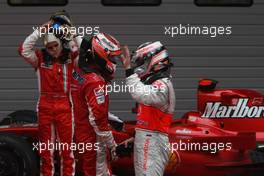 07.10.2007 Shanghai, China,  Felipe Massa (BRA), Scuderia Ferrari with 2nd place Fernando Alonso (ESP), McLaren Mercedes and 1st place Kimi Raikkonen (FIN), Räikkönen, Scuderia Ferrari - Formula 1 World Championship, Rd 16, Chinese Grand Prix, Sunday Podium