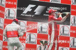 07.10.2007 Shanghai, China,  2nd place Fernando Alonso (ESP), McLaren Mercedes and 1st place Kimi Raikkonen (FIN), Räikkönen, Scuderia Ferrari - Formula 1 World Championship, Rd 16, Chinese Grand Prix, Sunday Podium