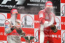 07.10.2007 Shanghai, China,  2nd place Fernando Alonso (ESP), McLaren Mercedes and 1st place Kimi Raikkonen (FIN), Räikkönen, Scuderia Ferrari - Formula 1 World Championship, Rd 16, Chinese Grand Prix, Sunday Podium