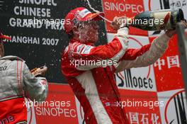 07.10.2007 Shanghai, China,  2nd place Fernando Alonso (ESP), McLaren Mercedes and 1st place Kimi Raikkonen (FIN), Räikkönen, Scuderia Ferrari - Formula 1 World Championship, Rd 16, Chinese Grand Prix, Sunday Podium