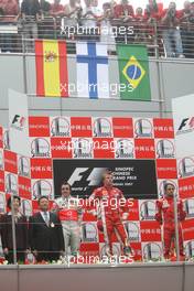 07.10.2007 Shanghai, China,  2nd place Fernando Alonso (ESP), McLaren Mercedes with 1st place Kimi Raikkonen (FIN), Räikkönen, Scuderia Ferrari, 3rd place Felipe Massa (BRA), Scuderia Ferrari and Rob Smedly, (GBR), Scuderia Ferrari, Track Engineer of Felipe Massa (BRA) - Formula 1 World Championship, Rd 16, Chinese Grand Prix, Sunday Podium