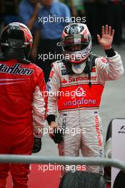 07.10.2007 Shanghai, China,  1st place Kimi Raikkonen (FIN), Räikkönen, Scuderia Ferrari and 2nd place Fernando Alonso (ESP), McLaren Mercedes - Formula 1 World Championship, Rd 16, Chinese Grand Prix, Sunday Podium