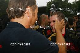 07.10.2007 Shanghai, China,  Sebastian Vettel (GER), Scuderia Toro Rosso and Gerhard Berger (AUT), Scuderia Toro Rosso, 50% Team Co Owner celebrate after he finished 4th - Formula 1 World Championship, Rd 16, Chinese Grand Prix, Sunday Podium