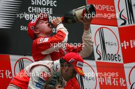 07.10.2007 Shanghai, China,  2nd place Fernando Alonso (ESP), McLaren Mercedes and 1st place Kimi Raikkonen (FIN), Räikkönen, Scuderia Ferrari - Formula 1 World Championship, Rd 16, Chinese Grand Prix, Sunday Podium