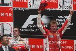 07.10.2007 Shanghai, China,  2nd place Fernando Alonso (ESP), McLaren Mercedes and 1st place Kimi Raikkonen (FIN), Räikkönen, Scuderia Ferrari - Formula 1 World Championship, Rd 16, Chinese Grand Prix, Sunday Podium