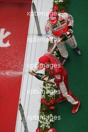 07.10.2007 Shanghai, China,  2nd place Fernando Alonso (ESP), McLaren Mercedes with 1st place Kimi Raikkonen (FIN), Räikkönen, Scuderia Ferrari - Formula 1 World Championship, Rd 16, Chinese Grand Prix, Sunday Podium