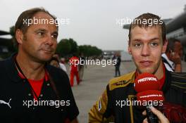 07.10.2007 Shanghai, China,  Gerhard Berger (AUT), Scuderia Toro Rosso, 50% Team Co Owner and Sebastian Vettel (GER), Scuderia Toro Rosso - Formula 1 World Championship, Rd 16, Chinese Grand Prix, Sunday Podium