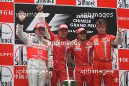 07.10.2007 Shanghai, China,  2nd place Fernando Alonso (ESP), McLaren Mercedes with 1st place Kimi Raikkonen (FIN), Räikkönen, Scuderia Ferrari, 3rd place Felipe Massa (BRA), Scuderia Ferrari and Rob Smedly, (GBR), Scuderia Ferrari, Track Engineer of Felipe Massa (BRA) - Formula 1 World Championship, Rd 16, Chinese Grand Prix, Sunday Podium