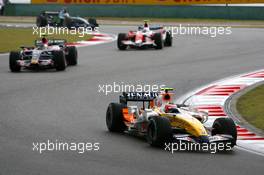 07.10.2007 Shanghai, China,  Heikki Kovalainen (FIN), Renault F1 Team, Sebastian Vettel (GER), Scuderia Toro Rosso - Formula 1 World Championship, Rd 16, Chinese Grand Prix, Sunday Race