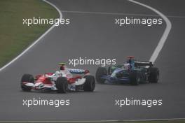 07.10.2007 Shanghai, China,  Jarno Trulli (ITA), Toyota Racing, TF107 leads Jenson Button (GBR), Honda Racing F1 Team, RA107 - Formula 1 World Championship, Rd 16, Chinese Grand Prix, Sunday Race