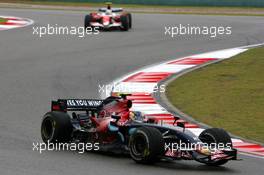 07.10.2007 Shanghai, China,  Sebastian Vettel (GER), Scuderia Toro Rosso, Jarno Trulli (ITA), Toyota Racing - Formula 1 World Championship, Rd 16, Chinese Grand Prix, Sunday Race