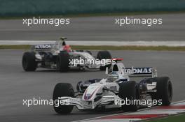 07.10.2007 Shanghai, China,  Nick Heidfeld (GER), BMW Sauber F1 Team, F1.07 and Robert Kubica (POL), BMW Sauber F1 Team, F1.07 - Formula 1 World Championship, Rd 16, Chinese Grand Prix, Sunday Race