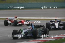 07.10.2007 Shanghai, China,  Jenson Button (GBR), Honda Racing F1 Team, RA107 and Nico Rosberg (GER), WilliamsF1 Team, FW29 - Formula 1 World Championship, Rd 16, Chinese Grand Prix, Sunday Race