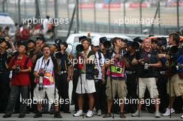 07.10.2007 Shanghai, China,  Photographers wait for Parc Ferme - Formula 1 World Championship, Rd 16, Chinese Grand Prix, Sunday Race