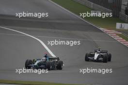 07.10.2007 Shanghai, China,  Jenson Button (GBR), Honda Racing F1 Team, RA107 leads Alexander Wurz (AUT), Williams F1 Team, FW29 - Formula 1 World Championship, Rd 16, Grand Prix, Sunday Race