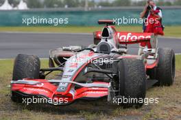 07.10.2007 Shanghai, China,  Lewis Hamilton's (GBR), McLaren Mercedes parked at the side of the track with badly worn tyres - Formula 1 World Championship, Rd 16, Chinese Grand Prix, Sunday Race