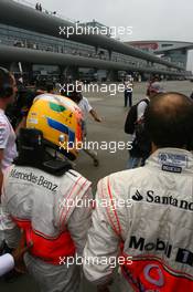 07.10.2007 Shanghai, China,  Lewis Hamilton (GBR), McLaren Mercedes, returns to the paddock after retiring from the race - Formula 1 World Championship, Rd 16, Chinese Grand Prix, Sunday