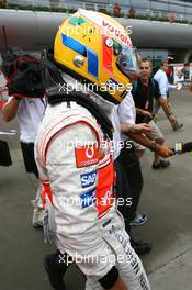 07.10.2007 Shanghai, China,  Lewis Hamilton (GBR), McLaren Mercedes, returns to the paddock after retiring from the race - Formula 1 World Championship, Rd 16, Chinese Grand Prix, Sunday