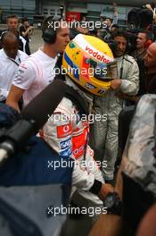 07.10.2007 Shanghai, China,  Lewis Hamilton (GBR), McLaren Mercedes, returns to the paddock after retiring from the race - Formula 1 World Championship, Rd 16, Chinese Grand Prix, Sunday