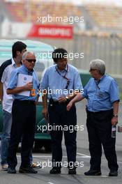 04.10.2007 Shanghai, China,  Charlie Whiting (GBR), FIA Safty delegate, Race director & offical starter and Herbie Blash (GBR), FIA Observer inspect the circuit - Formula 1 World Championship, Rd 16, Chinese Grand Prix, Thursday