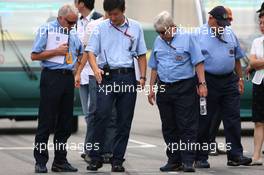 04.10.2007 Shanghai, China,  Charlie Whiting (GBR), FIA Safty delegate, Race director & offical starter and Herbie Blash (GBR), FIA Observer inspect the circuit - Formula 1 World Championship, Rd 16, Chinese Grand Prix, Thursday