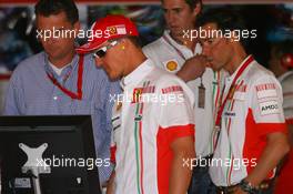 11.05.2007 Barcelona, Spain,  Michael Schumacher (GER), Scuderia Ferrari, Advisor and David Meca (ESP), Long distance swimmer (far right) - Formula 1 World Championship, Rd 4, Spanish Grand Prix, Friday Practice