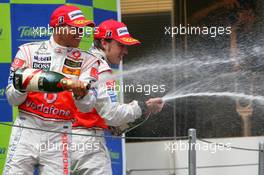 13.05.2007 Barcelona, Spain,  2nd, Lewis Hamilton (GBR), McLaren Mercedes, 3rd, Fernando Alonso (ESP), McLaren Mercedes - Formula 1 World Championship, Rd 4, Spanish Grand Prix, Sunday Podium