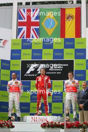 13.05.2007 Barcelona, Spain,  Lewis Hamilton (GBR), McLaren Mercedes with 1st place Felipe Massa (BRA), Scuderia Ferrari and Fernando Alonso (ESP), McLaren Mercedes - Formula 1 World Championship, Rd 4, Spanish Grand Prix, Sunday Podium