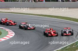 13.05.2007 Barcelona, Spain,  Start, Felipe Massa (BRA), Scuderia Ferrari, F2007, Fernando Alonso (ESP), McLaren Mercedes, MP4-22, Lewis Hamilton (GBR), McLaren Mercedes, MP4-22, Kimi Raikkonen (FIN), Räikkönen, Scuderia Ferrari, F2007 - Formula 1 World Championship, Rd 4, Spanish Grand Prix, Sunday Race