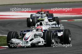 13.05.2007 Barcelona, Spain,  Robert Kubica (POL), BMW Sauber F1 Team, F1.07 leads Nick Heidfeld (GER), BMW Sauber F1 Team, F1.07 - Formula 1 World Championship, Rd 4, Spanish Grand Prix, Sunday Race