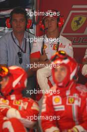 13.05.2007 Barcelona, Spain,  Michael Schumacher (GER), Scuderia Ferrari, Advisor views the race from the Ferrari garage - Formula 1 World Championship, Rd 4, Spanish Grand Prix, Sunday Race