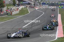 13.05.2007 Barcelona, Spain,  Nico Rosberg (GER), WilliamsF1 Team, FW29 and Rubens Barrichello (BRA), Honda Racing F1 Team, RA107 - Formula 1 World Championship, Rd 4, Spanish Grand Prix, Sunday Race