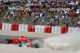 13.05.2007 Barcelona, Spain,  Fernando Alonso (ESP), McLaren Mercedes, MP4-22 and Felipe Massa (BRA), Scuderia Ferrari, F2007, come together at turn 1 - Formula 1 World Championship, Rd 4, Spanish Grand Prix, Sunday Race