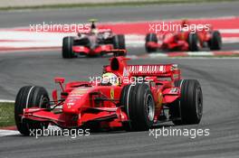 13.05.2007 Barcelona, Spain,  Felipe Massa (BRA), Scuderia Ferrari, F2007 leads Lewis Hamilton (GBR), McLaren Mercedes, MP4-22 - Formula 1 World Championship, Rd 4, Spanish Grand Prix, Sunday Race