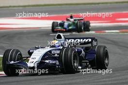 13.05.2007 Barcelona, Spain,  Nico Rosberg (GER), WilliamsF1 Team, FW29 leads Rubens Barrichello (BRA), Honda Racing F1 Team, RA107 - Formula 1 World Championship, Rd 4, Spanish Grand Prix, Sunday Race