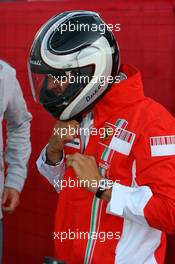 12.05.2007 Barcelona, Spain,  Michael Schumacher (GER), Scuderia Ferrari, Advisor leaves the track on a Ducati - Formula 1 World Championship, Rd 4, Spanish Grand Prix, Saturday