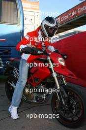 12.05.2007 Barcelona, Spain,  Michael Schumacher (GER), Scuderia Ferrari, Advisor leaves the track on a Ducati - Formula 1 World Championship, Rd 4, Spanish Grand Prix, Saturday