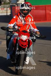 12.05.2007 Barcelona, Spain,  Michael Schumacher (GER), Scuderia Ferrari, Advisor leaves the track on a Ducati - Formula 1 World Championship, Rd 4, Spanish Grand Prix, Saturday