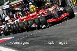 12.05.2007 Barcelona, Spain,  Cars lined up at the pit exit - Formula 1 World Championship, Rd 4, Spanish Grand Prix, Saturday Qualifying