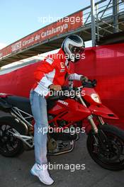 12.05.2007 Barcelona, Spain,  Michael Schumacher (GER), Scuderia Ferrari, Advisor leaves the track on a Ducati - Formula 1 World Championship, Rd 4, Spanish Grand Prix, Saturday