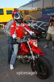 12.05.2007 Barcelona, Spain,  Michael Schumacher (GER), Scuderia Ferrari, Advisor leaves the track on a Ducati - Formula 1 World Championship, Rd 4, Spanish Grand Prix, Saturday